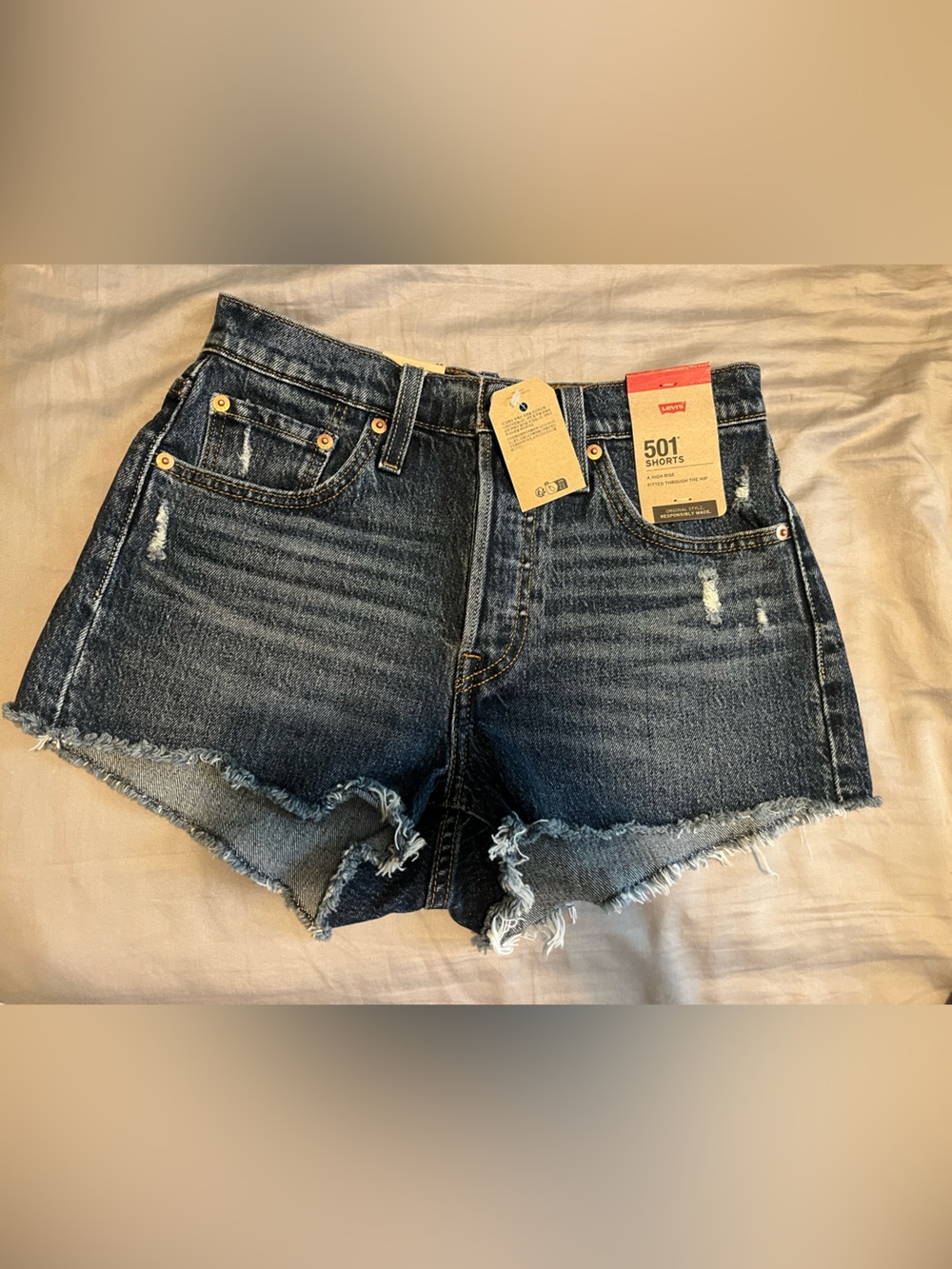 NWT Levi's 501 Women's Dark Blue Distressed Denim Cutoff Shorts size 25